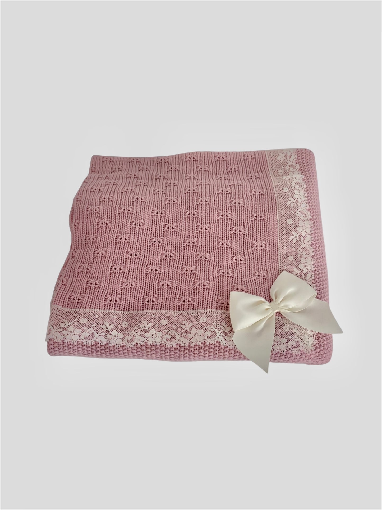 Manta rosa empolvado