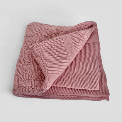 Manta rosa empolvado